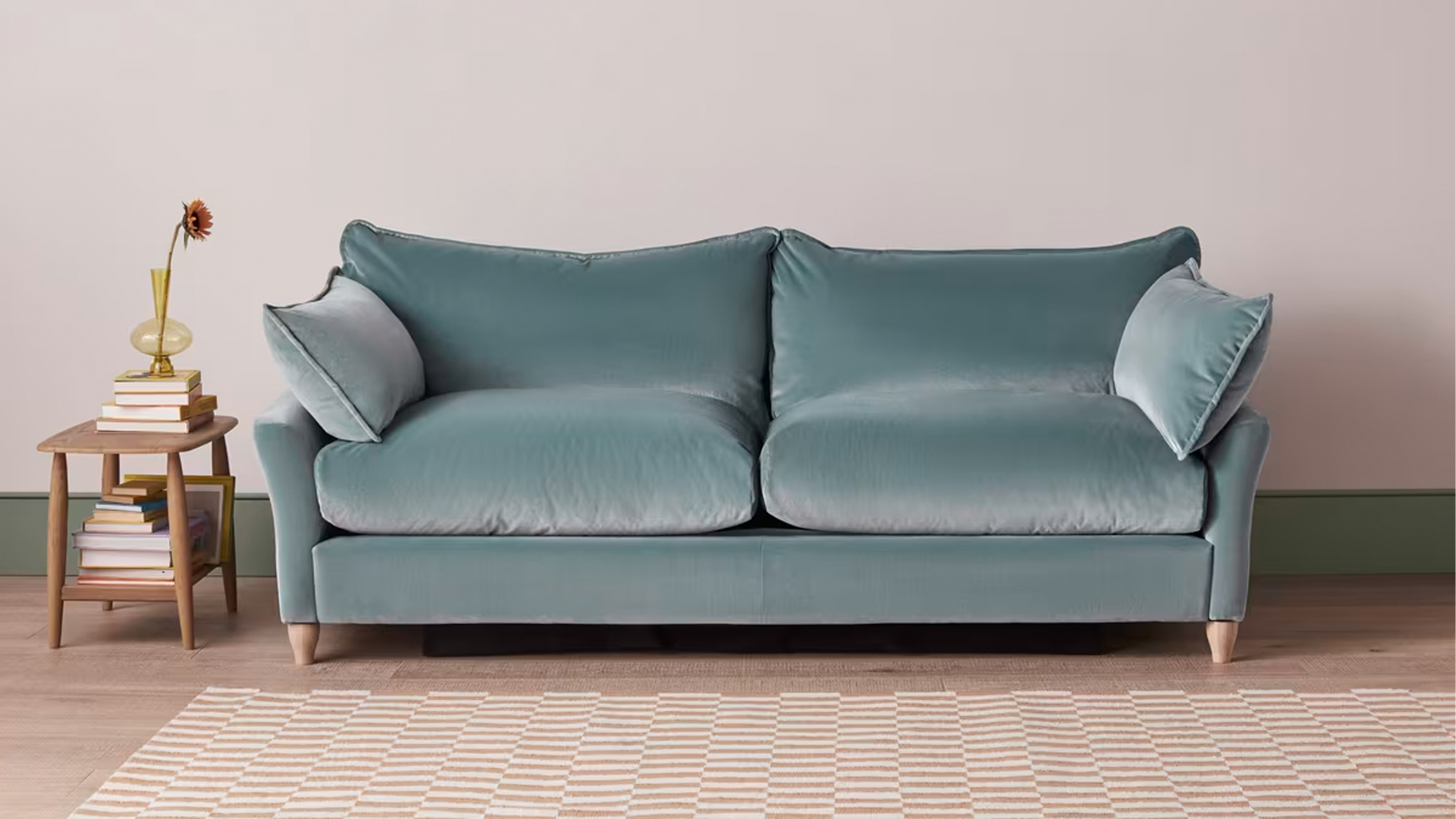 A blue velvet Loaf sofa bed