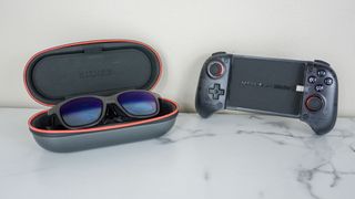 The Viture x 8BitDo Ultimate Mobile Gaming Controller next to the Viture XR Pro glasses on a desk