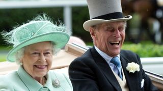 Prince Philip and the Queen beaming for the cameras at Royal Ascot in 2012