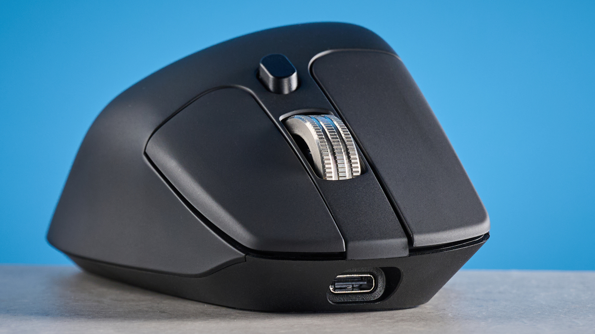 A black Keychron M6 8K ergonomic mouse