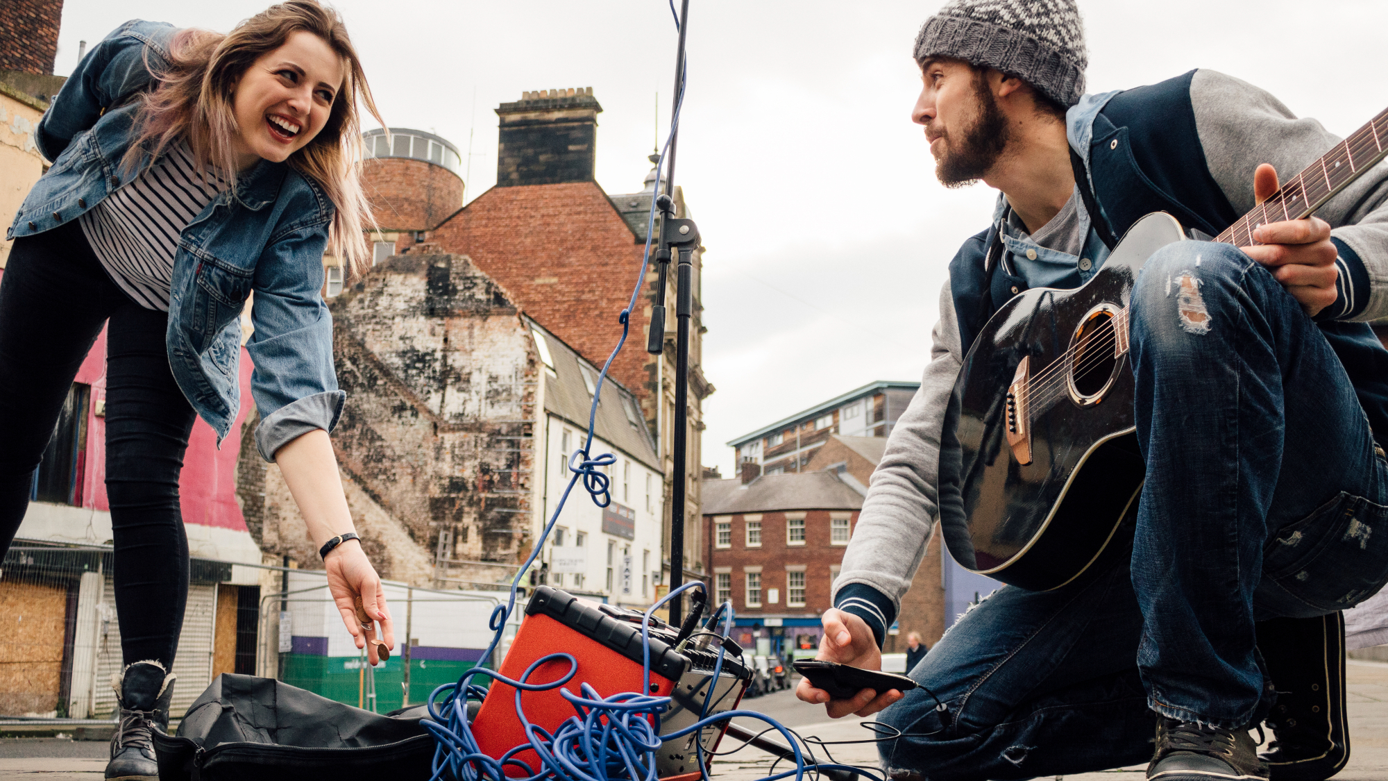 Man busking with Roland Street Cube