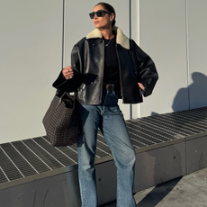 woman wearing winter denim outfit idea 2025