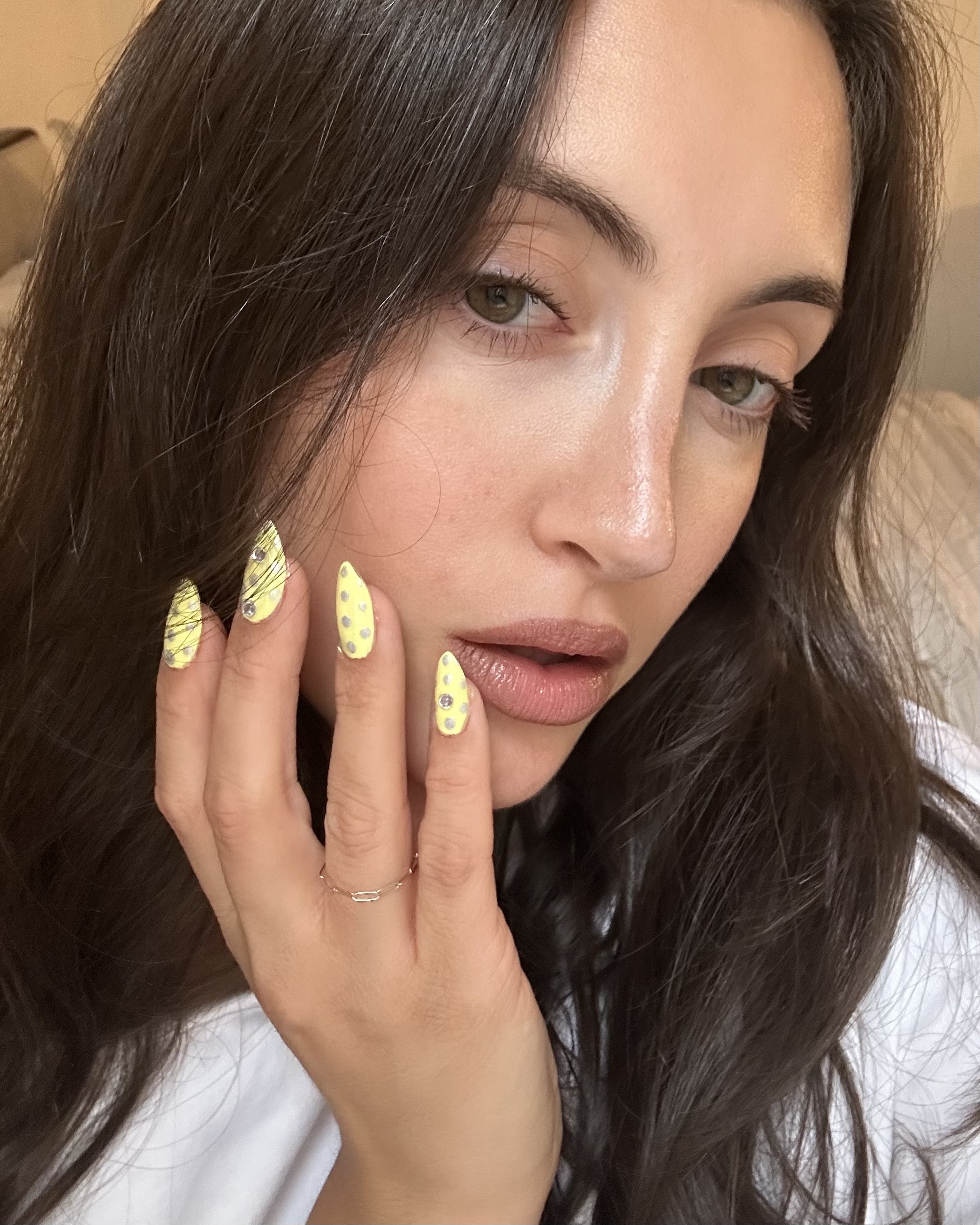 WWW associate beauty editor Alyssa Brascia wearing the MAC Cosmetics Creamy Lip Liner in Greige.