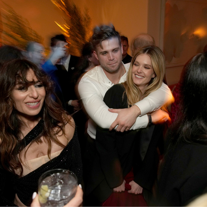 Sabrina Impacciatore (2nd L), Leo Woodall (C) and Meghann Fahy (R) attend the HBO & Max Post Emmys Reception at San Vicente Bungalows on January 15, 2024 in West Hollywood, California.