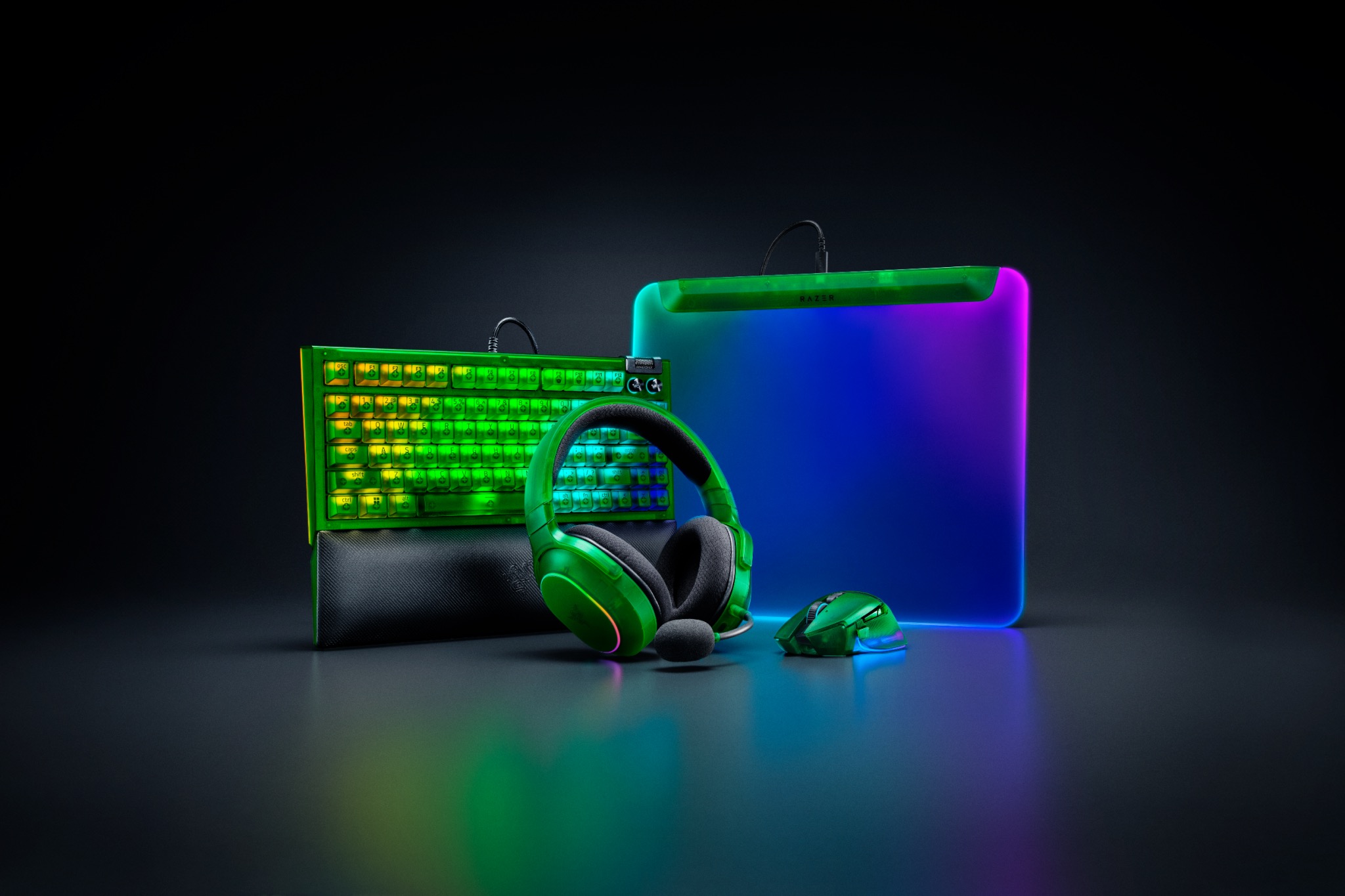 Razer&#039;s Phantom Collection displayed against a dark background, showcasing its all-translucent design and vibrant Razer Chroma RGB lighting. 