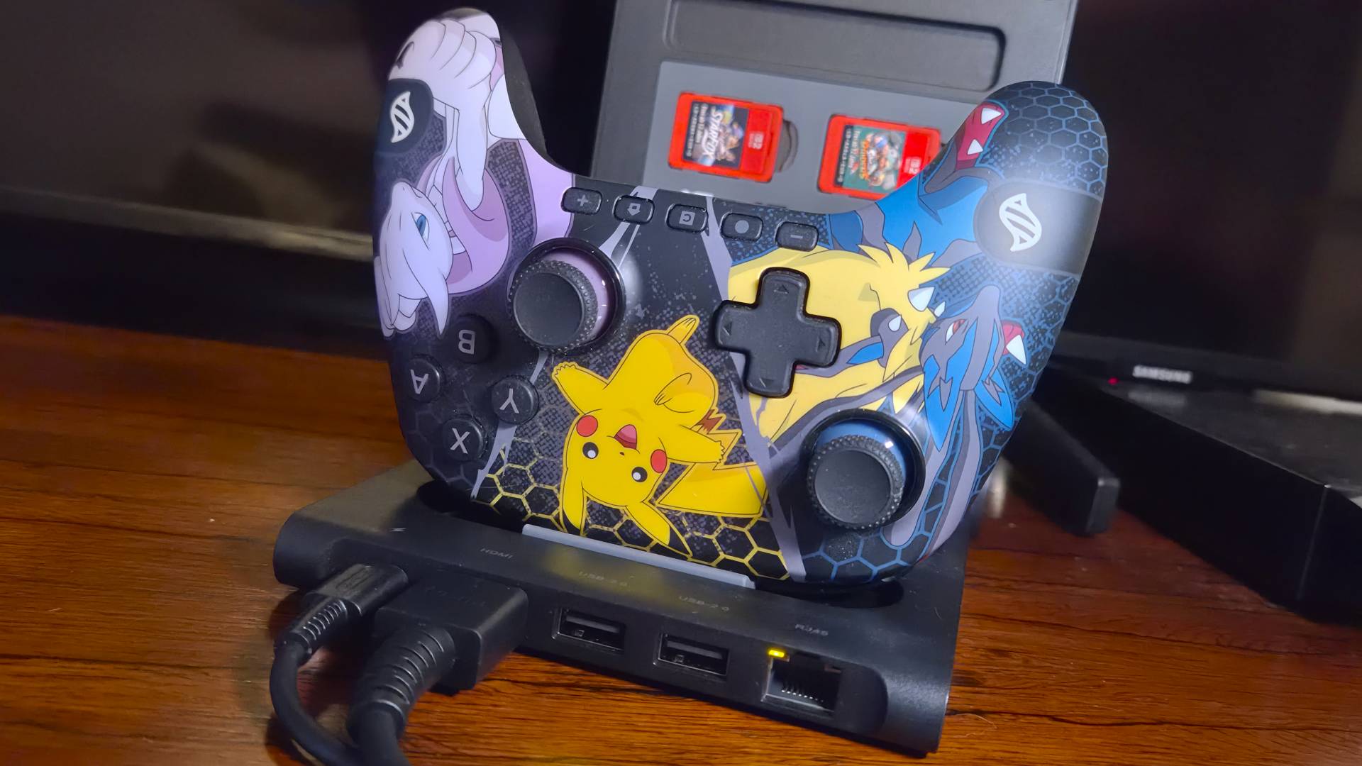 Photo of a PowerA Pokemon controller sitting in the JSAUX 6-in-1 Gaming Dock for the Switch 2.