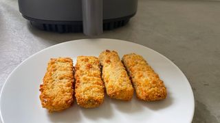 Fishfingers in front of the Cosori Lite Air Fryer