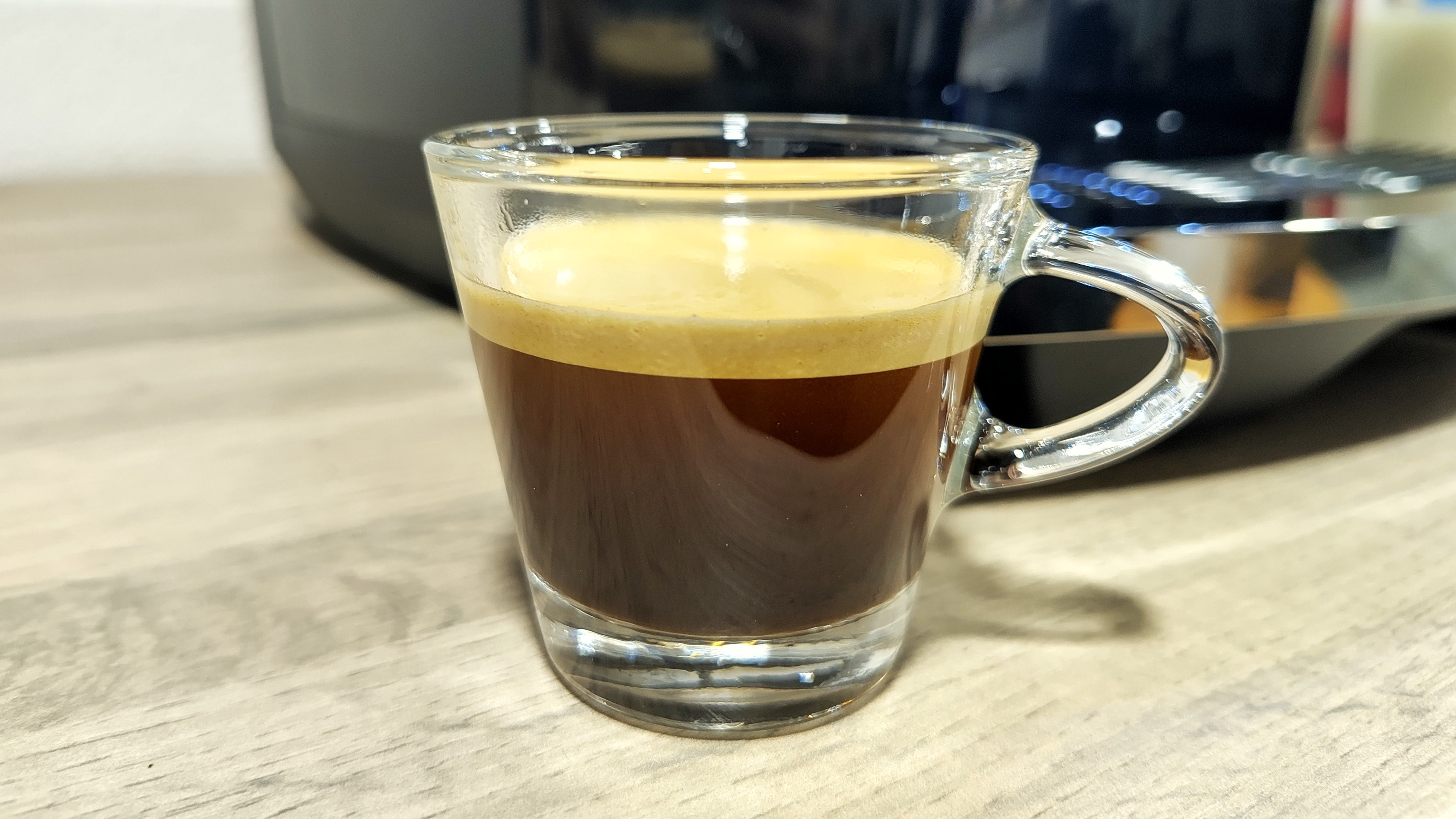 Cup of espresso made using Jura J10 coffee maker