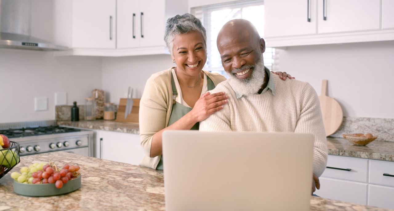 Two people looking at a computer screen