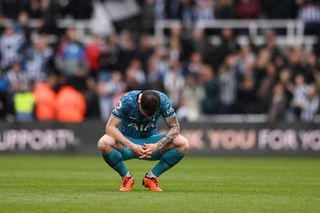 Pierre-Emile Hojbjerg of Tottenham Hotspur looks dejected following the team's defeat during the Premier League match between Newcastle United and Tottenham Hotspur at St. James Park on April 23, 2023 in Newcastle upon Tyne, England.