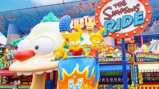 The ride entrance and midway at The Simpsons Ride.