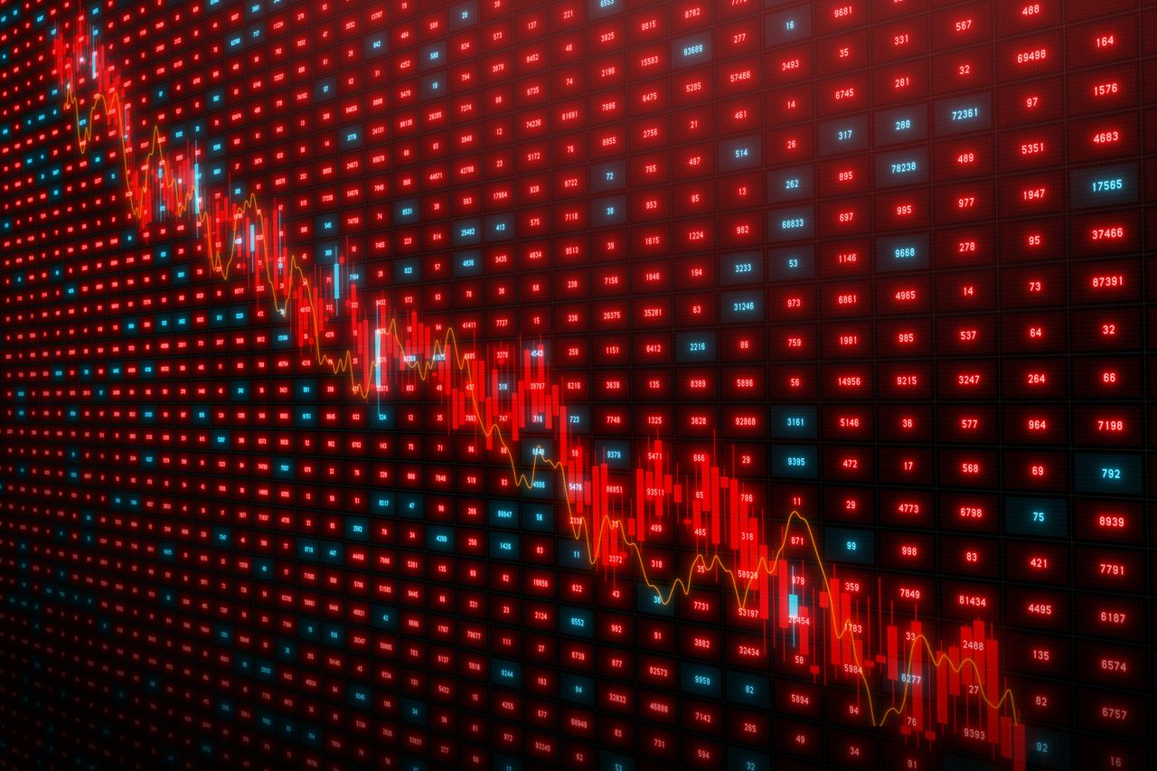 Recession stock market financial chart on a trading board background.