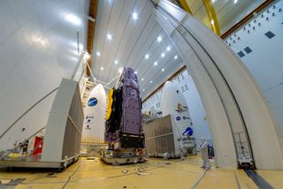 NASA's James Webb Space Telescope is seen during payload fairing encapsulation ahead of its installation atop its Ariane 5 rocket for a Dec. 24, 2021 launch from the Guiana Space Center in Kourou, French Guiana.