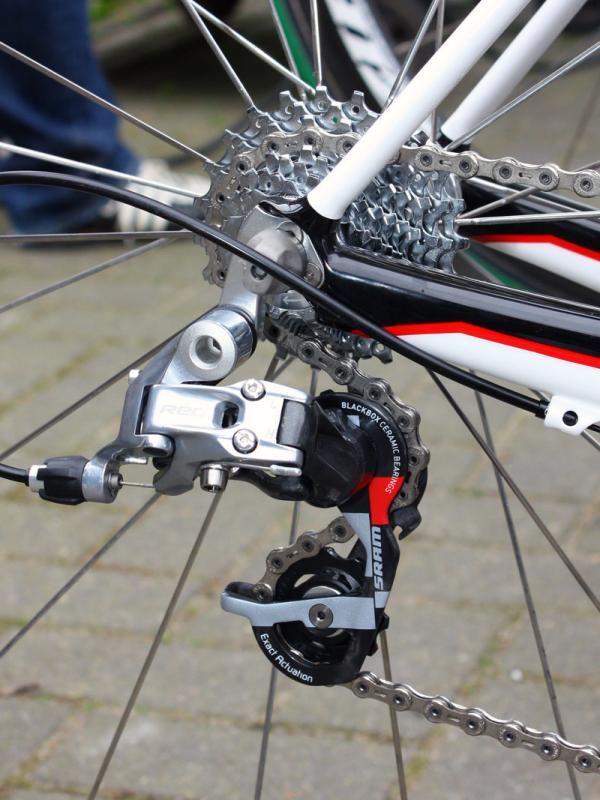 A SRAM Red rear derailleur is affixed to a replaceable hanger.