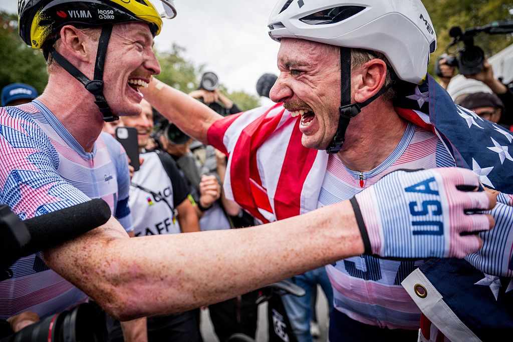 Matteo Jorgenson and Brandon McNulty (USA) celebrate after the elite men's road race at the 2026 UCI Road World Championship, in Montreal, Canada. BELGA PHOTO JASPER JACOBS (Photo by JASPER JACOBS / BELGA MAG / Belga / AFP via Getty Images)