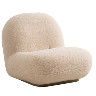 A curvy beige fleece chair