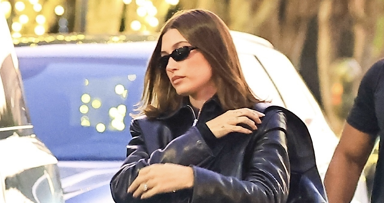 hailey beiber wears a leather jacket and slippers on dec. 23