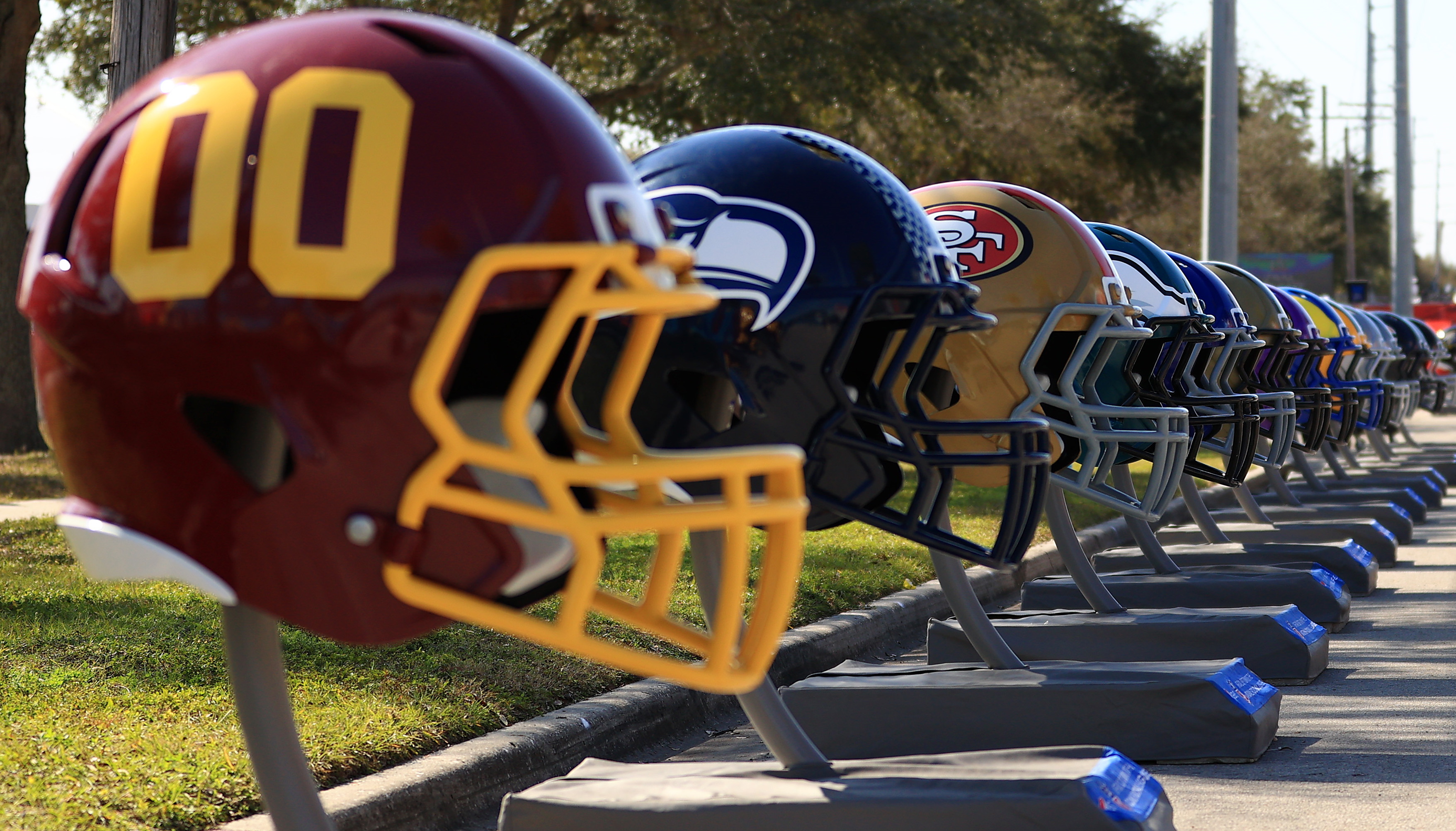 NFL helmets in a row