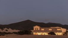 Le Dune exterior at night