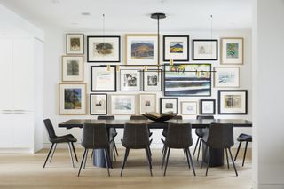 Modern dining room with gallery wall