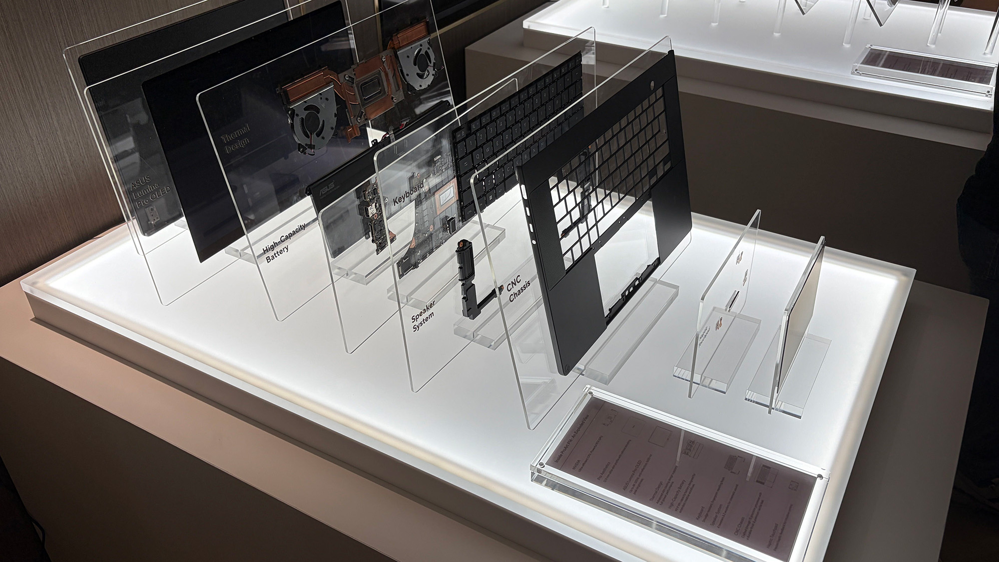 ASUS ProArt P16 laptop samples on display shelving highlighting chassis and features at Computex 2026