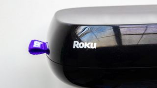 Roku streaming device against a white background
