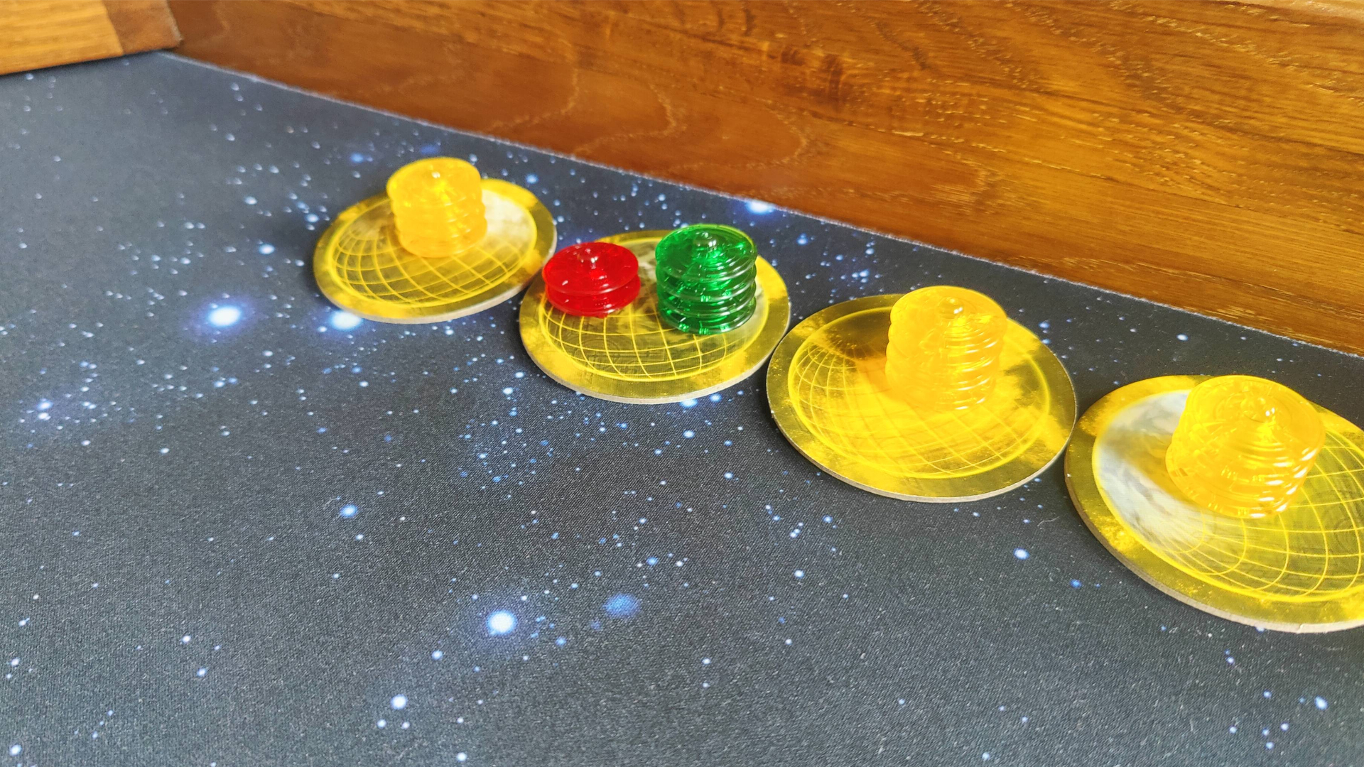 Red and green players get to claim their reward, capturing one of the yellow planets - Cosmic Encounter