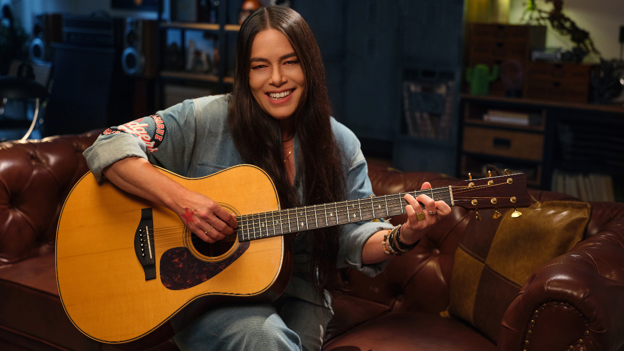 Rachael Yamagata with a guitar