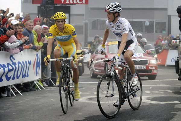 Andy Schleck (Saxo Bank) and Alberto Contador (Astana) reach to shake hands after the finish.
