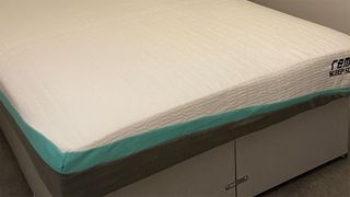 The REM-Fit 500 Ortho Hybrid mattress on a bed