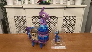 Lego Fortnite Supply Llama (77071) alongside the original Supply Llama sent to creators