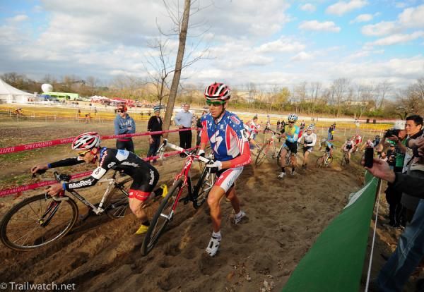 Todd Wells (Specialized) and Justin Lindine (BikeReg.com-Joe's Garage) run through the sand.