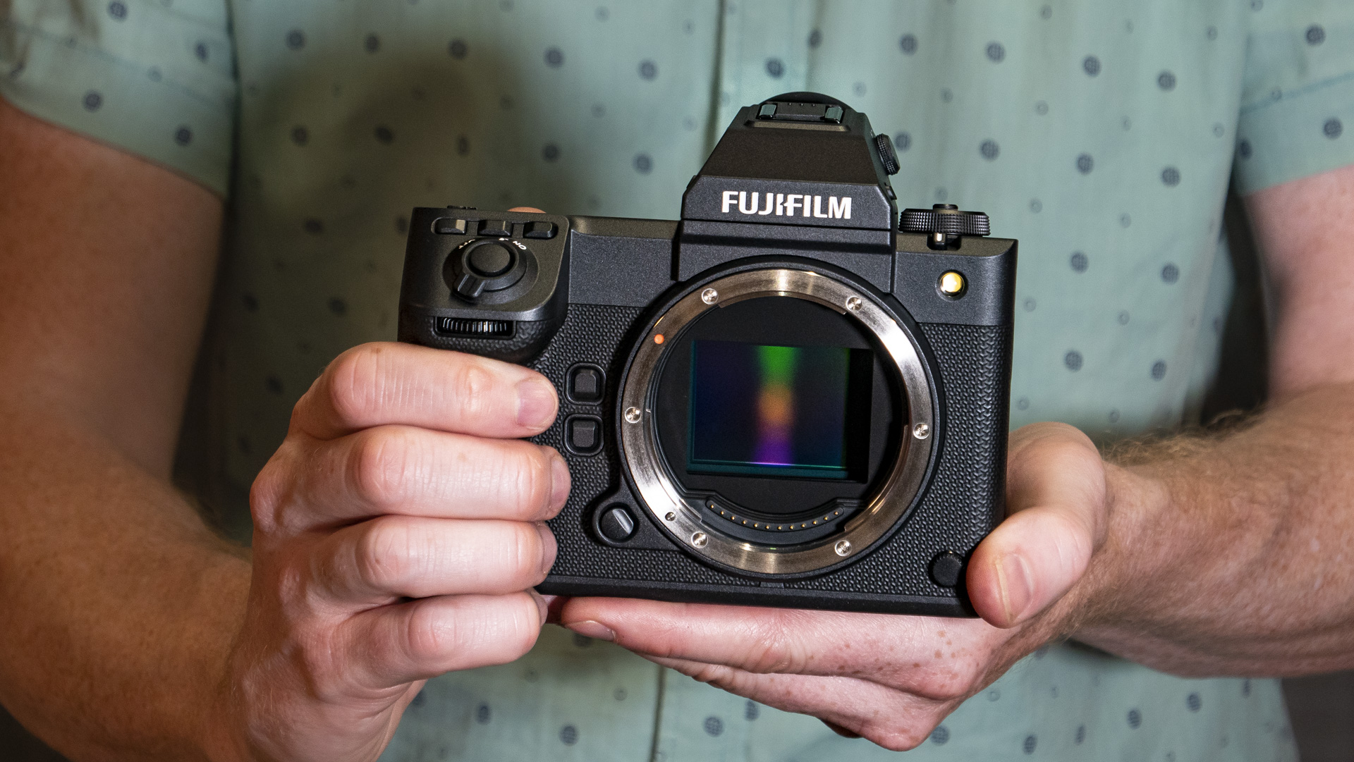 Fujifilm GFX100 II in the hand