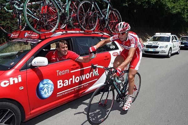 Francesco Bellotti gets some support from the Barloworld team car.
