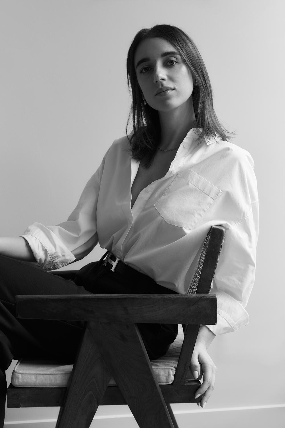 a woman sitting in a chair