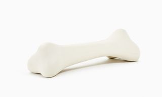 Sculptural bench in the shape of a giant bone