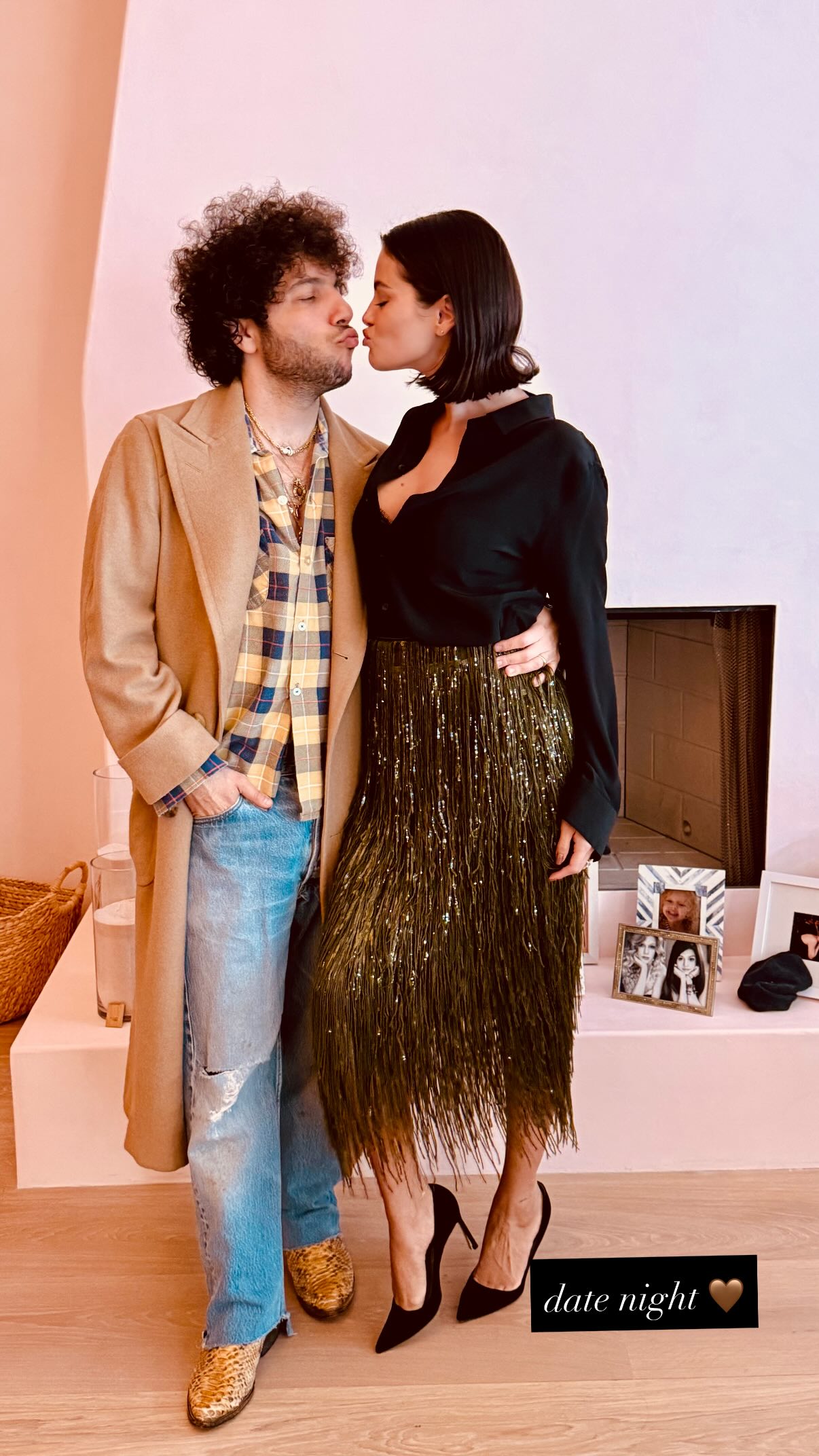 Selena Gomez joined Benny Blanco on a date night in a fringed midi skirt and a black blouse