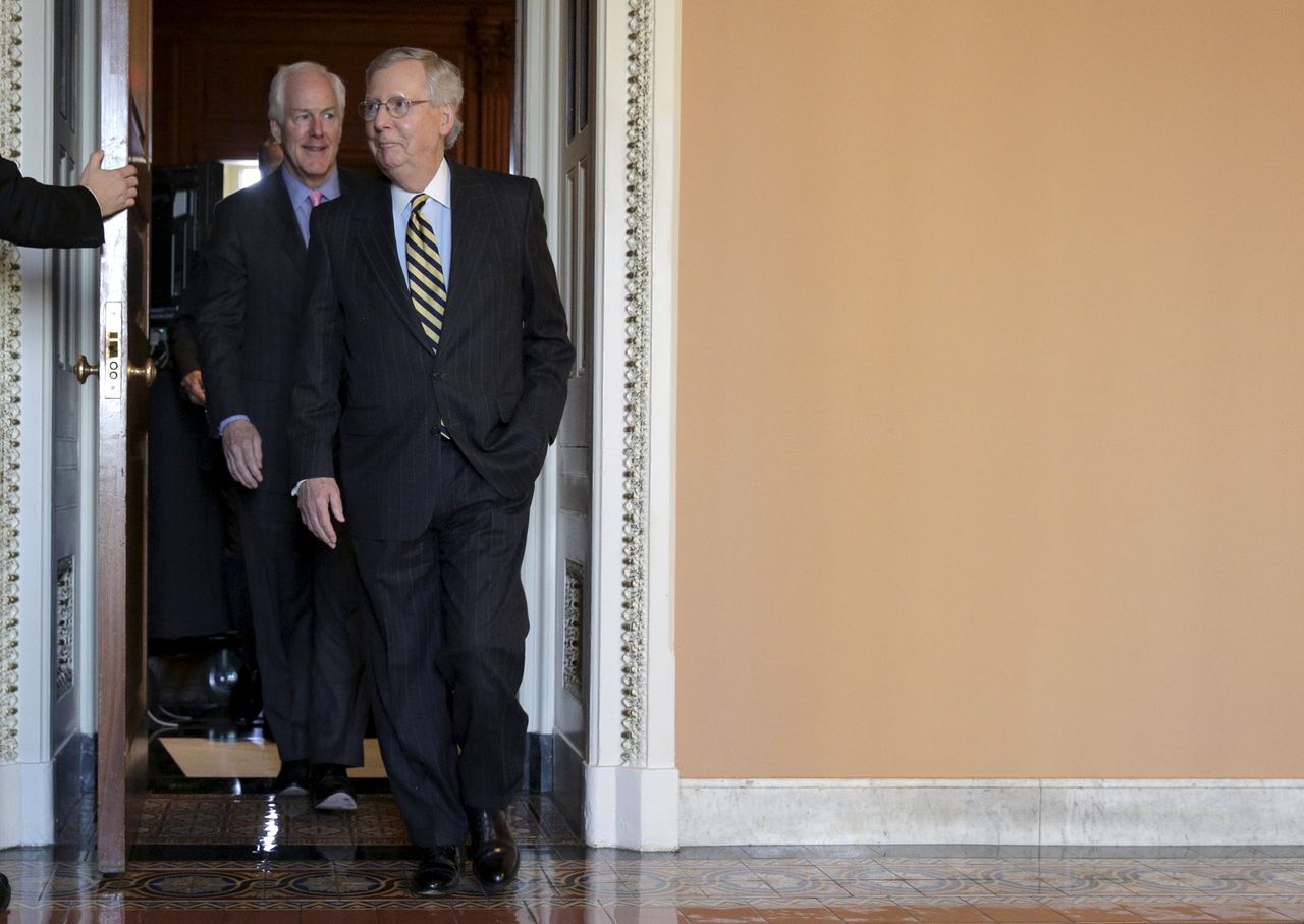 Sen. Mitch McConnell and other Republican senators.