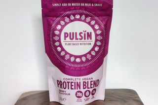 A pouch of Pulsin Protein Complete Vegan Blend powder