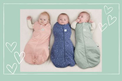 Three babies lie side by side wrapped in Ergopouch Cocoon Swaddle Bags