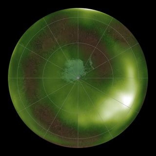 This NASA image shows the ultraviolet "nightglow" in the atmosphere of Mars over the south pole. Green and white false colors represent the intensity of ultraviolet light, with white being the brightest.