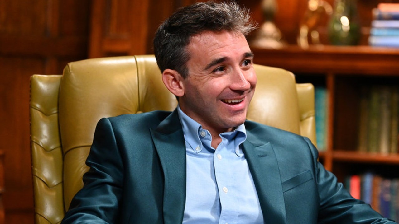 Ian sitting in a chair