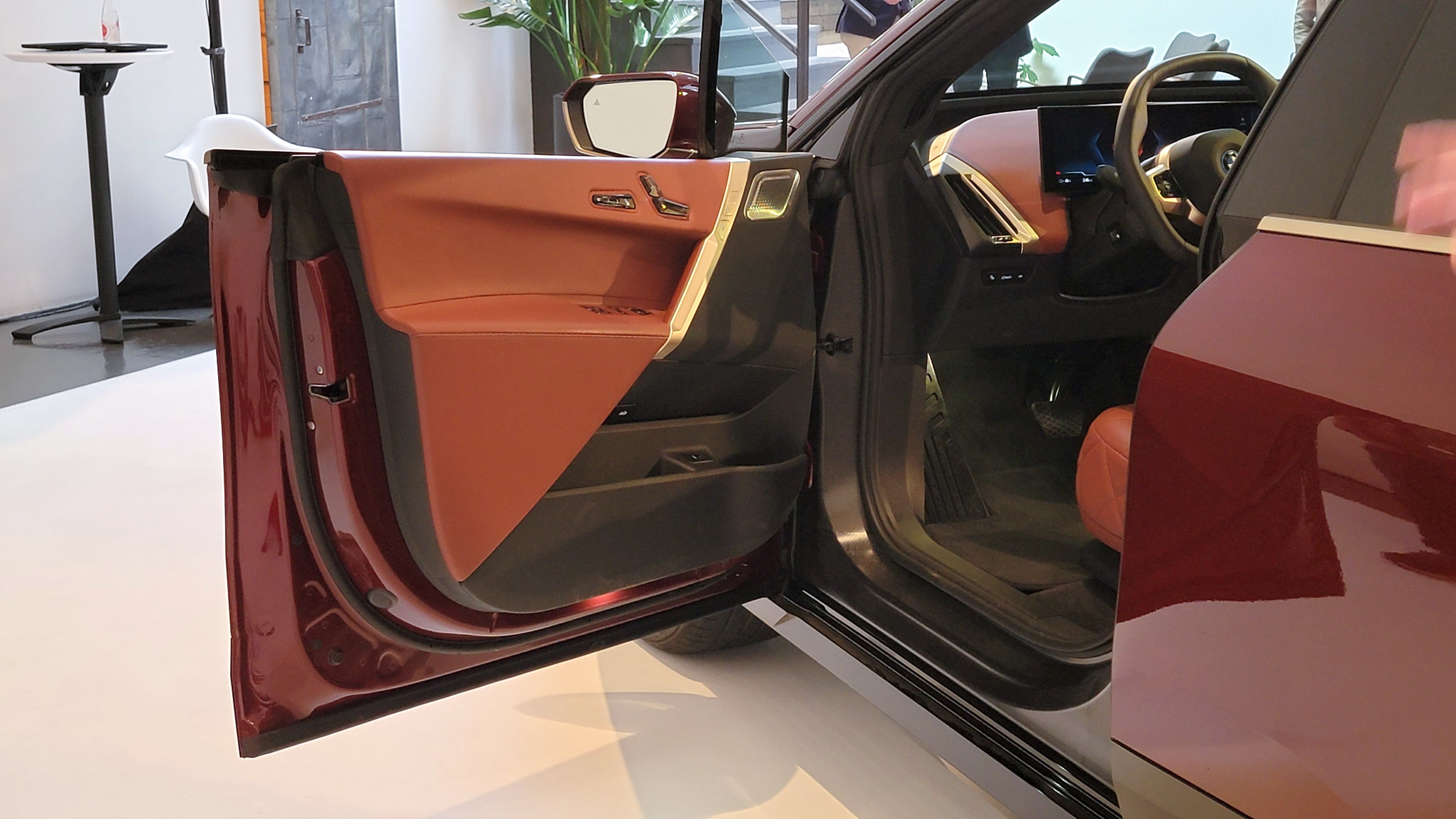 View inside of the BMW iX from the driver's open door