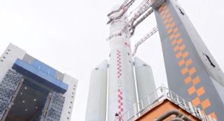 China's Long March 5 heavy-lift rocket rolls out ahead of a return-to-flight launch planned for Dec. 27, 2019.