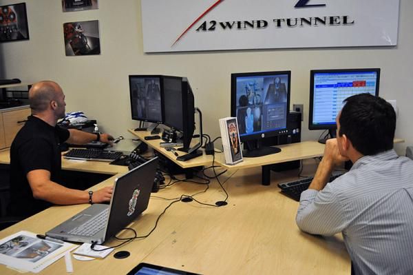 A2 Wind Tunnel's Mike Giraud, left, and Chris Boardman observe Rory Sutherland's wind tunnel session.