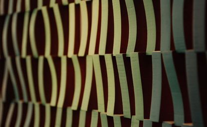 Detail from Hologram, 2009. Rows of vertical rectangular objects sticking out at different angles.