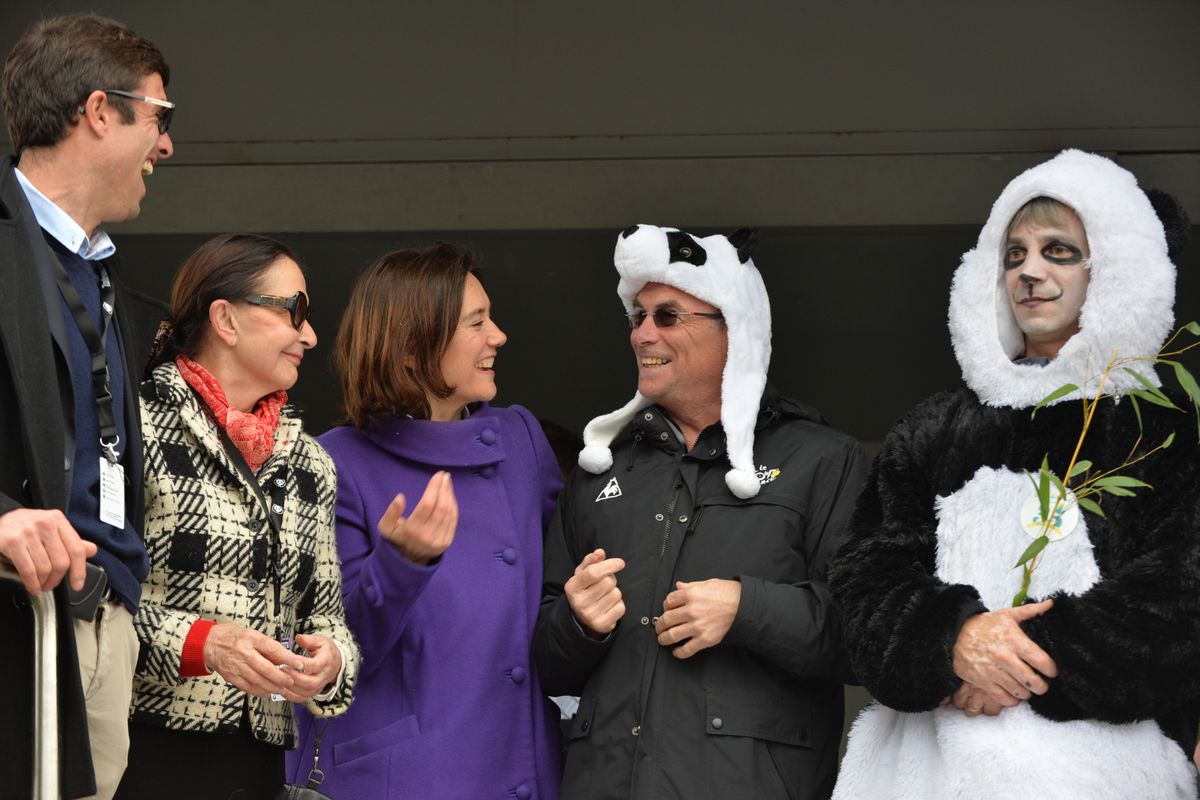 Panda hats were all the fashion at the ZooParc de Beauval. Five-time Tour winner Bernard Hinault models one on the stage