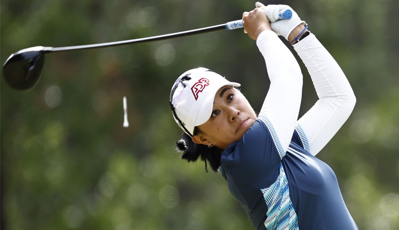 Danielle Kang hits a tee shot