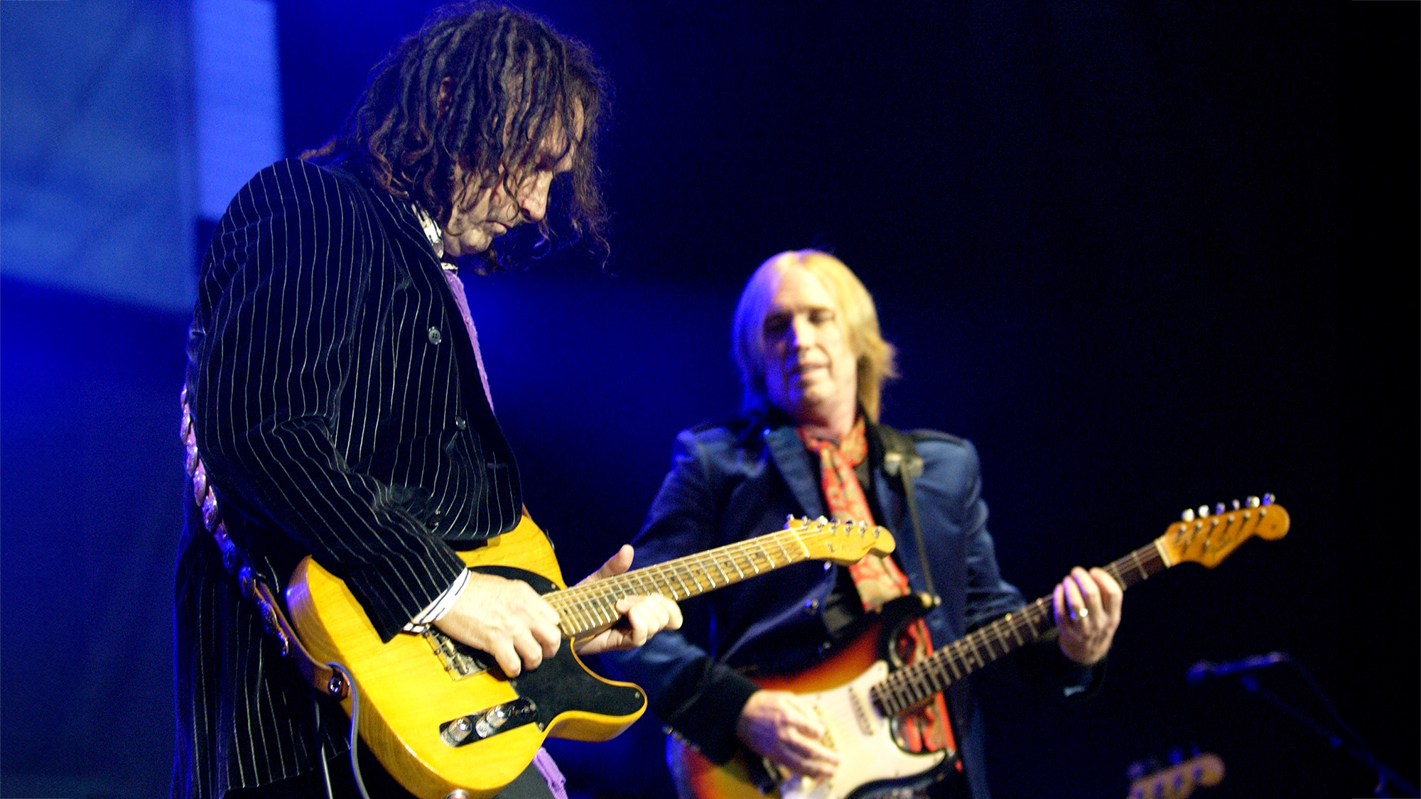 Mike Campbell (L) and Tom Petty perform part of the Heartbreakers Summer Tour 2005 at the Greek Theater on August 26, 2005 in Berkeley California.