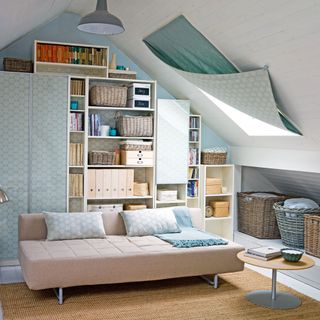 room with blue furnishing with white roof